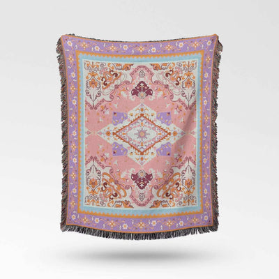 Close-up of the Blush & Breeze Boho Rug showing intricate blush, blue, and cream patterns with delicate fringe details