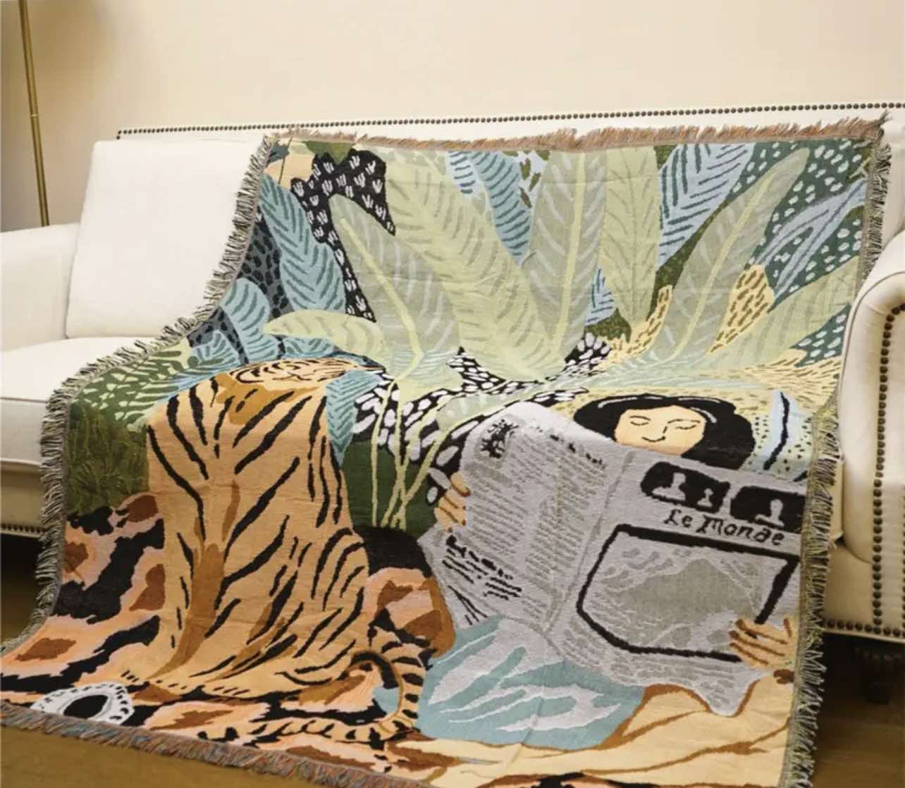 Close-up of the Serenity Forest Throw Blanket displaying the vibrant green and earthy tones of the design.