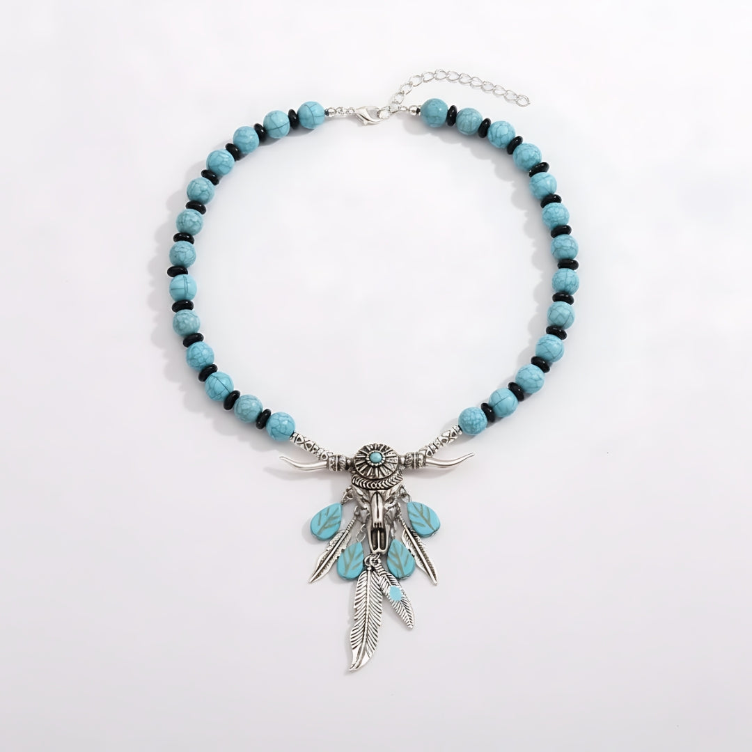 Coastal Dreamcatcher Necklace Perth Australia Houseofhide photographed in soft light revealing turquoise and silver accents.