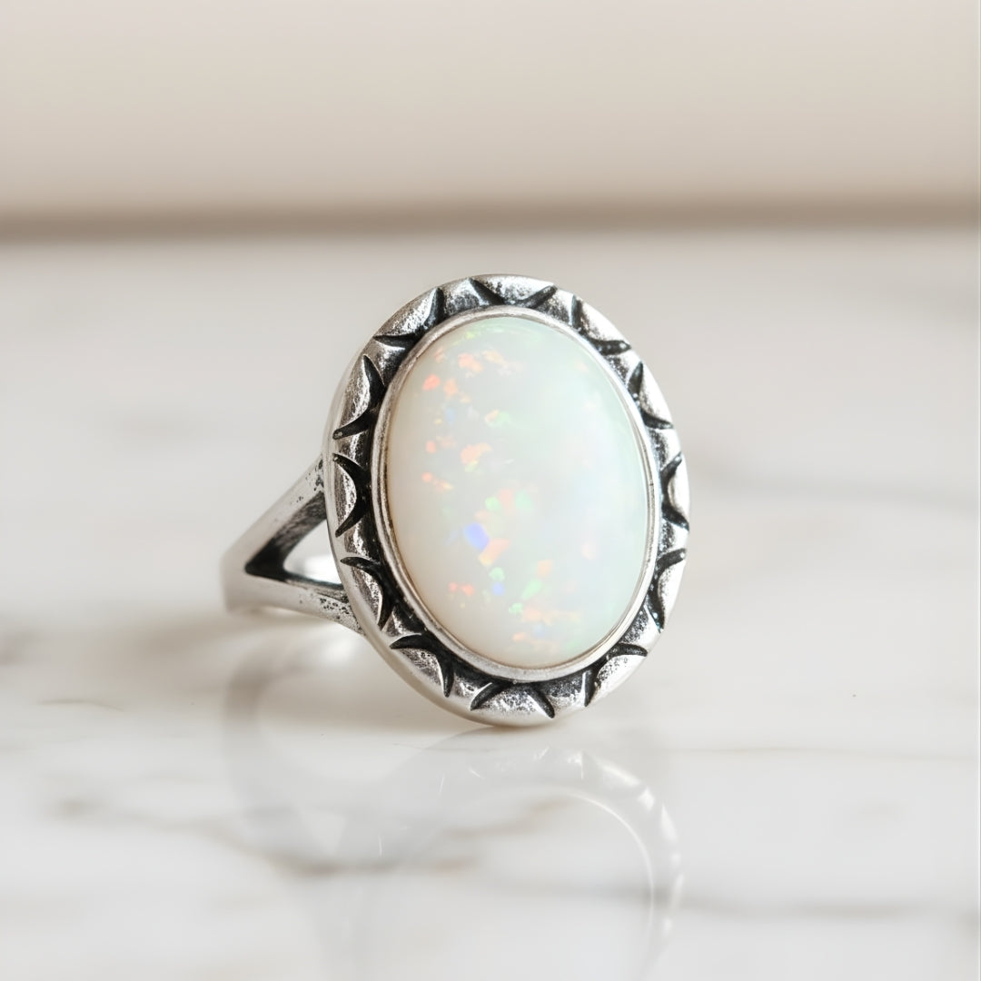 Radiant Coral Dream Opal Ring featuring luminous white opal stone on white backdrop