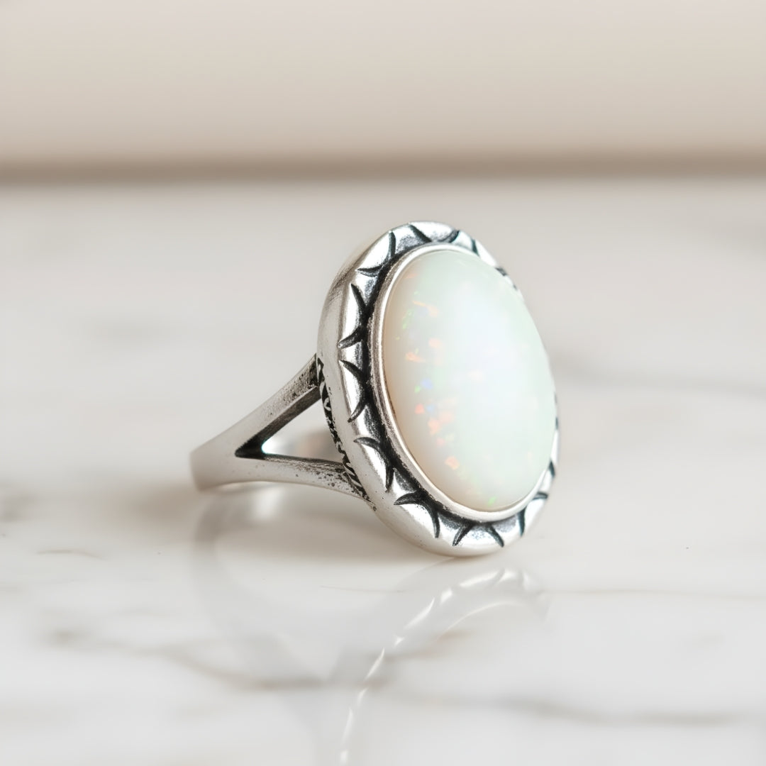 Elegant Coral Dream Opal Ring displayed on white surface luxury jewellery Perth