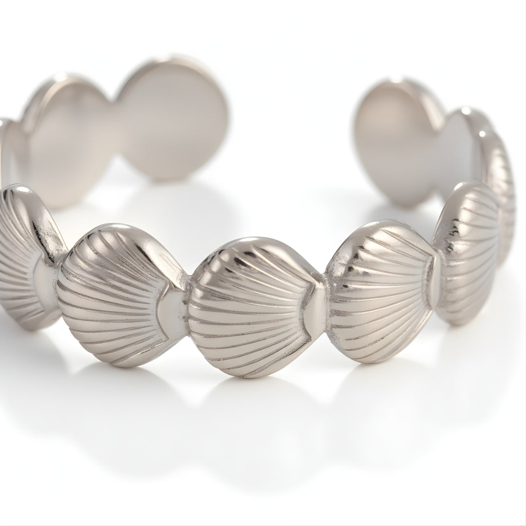 Coral Sands Ring Perth Australia Houseofhide photographed in soft light showing polished silver texture and seaside charm.