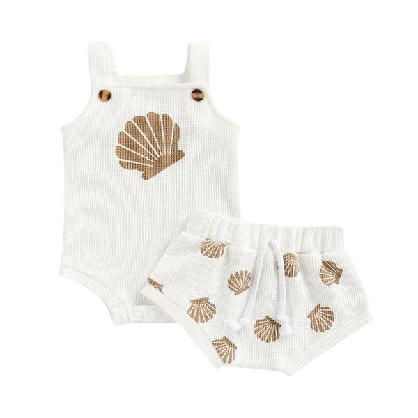 Cozy seashell-patterned baby outfit in soft knit, ideal for playdates and special events.