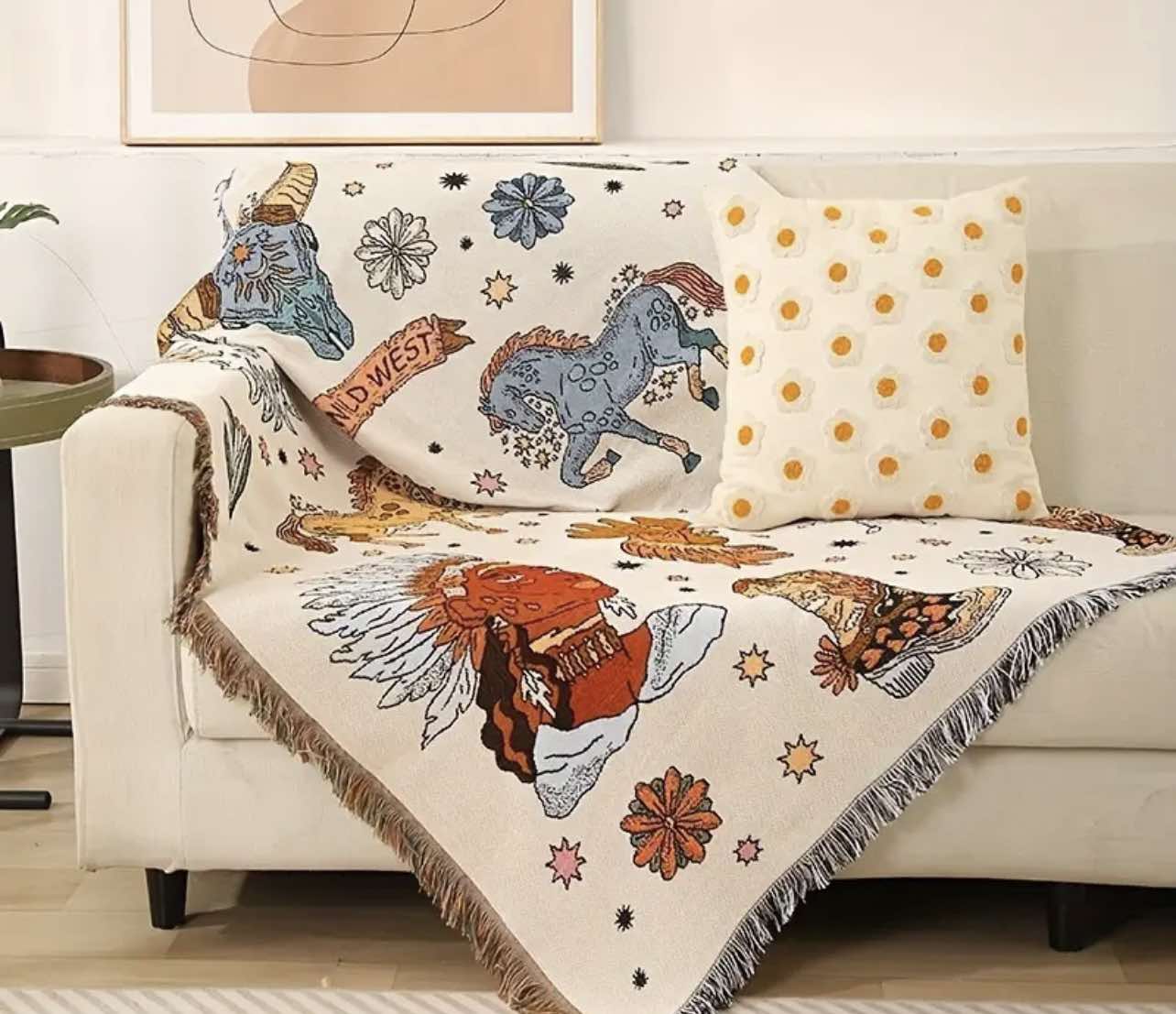 Detail of the tassels on the Western Rodeo Woven Throw Blanket, adding a decorative and functional touch to the design.