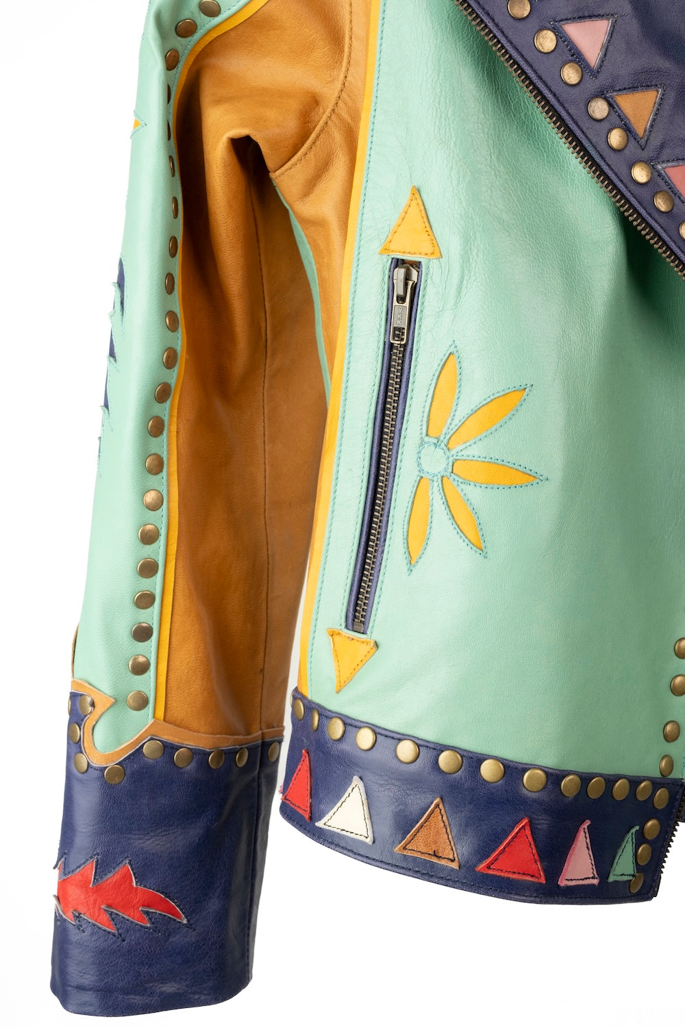 Front view of Desert Sunrise leather jacket with colourful patchwork and studded lapels