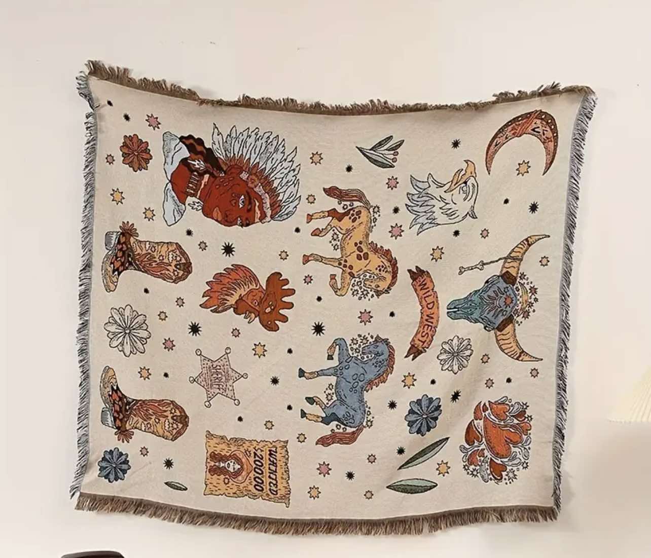 Full view of the Western Rodeo Woven Throw Blanket folded on an armchair, highlighting its versatility as a multi-function throw.