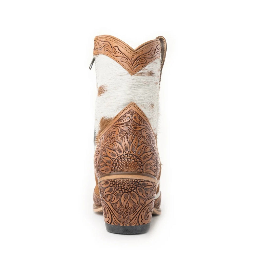 Rear view of a Georgia boot showing sunflower tooling across the leather heel panel and block heel.