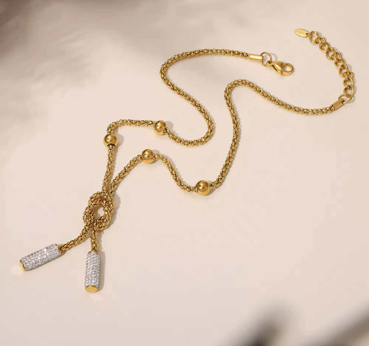 Country-style waterproof necklace for women Gold-plated Y-necklace with rhinestone pendant, styled for country-boho fashion.