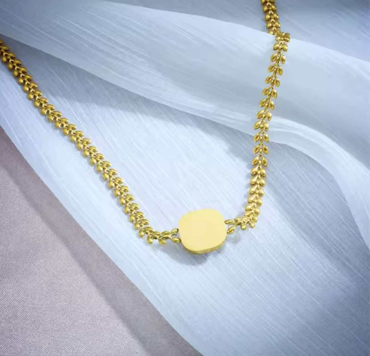 Gold earrings and necklace set – perfect for bridesmaids or events