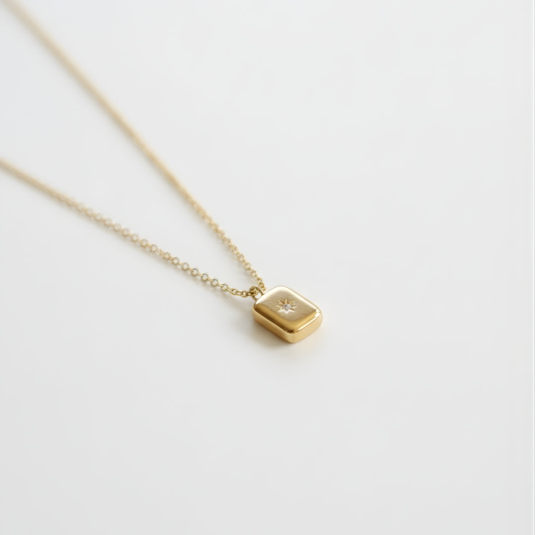 Golden Aurora Necklace Perth Australia House of Hide gold pendant necklace with engraved star detail