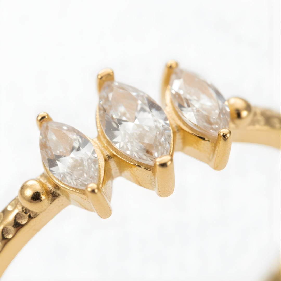 Golden Mirage Ring Perth Australia Houseofhide on reflective surface.