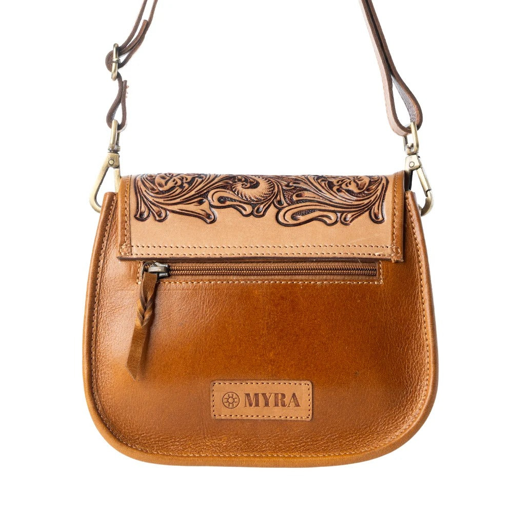 House of Hide genuine leather brown handbag featuring intricate tooled designs and MYRA branding detail on a white background