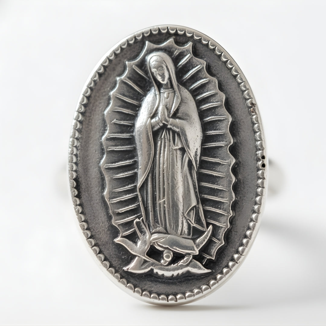 Intricately designed silver ring by House of Hide Perth displayed on white surface