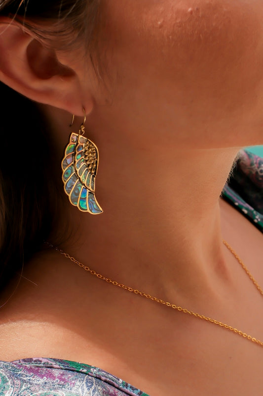 Hand-carved paua shell earrings in angel wing shape