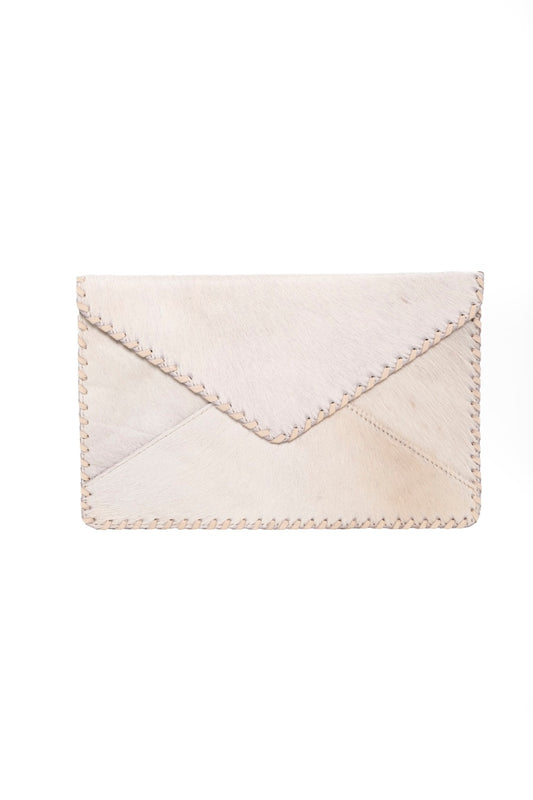 Hand-cut from genuine pale tan cowhide