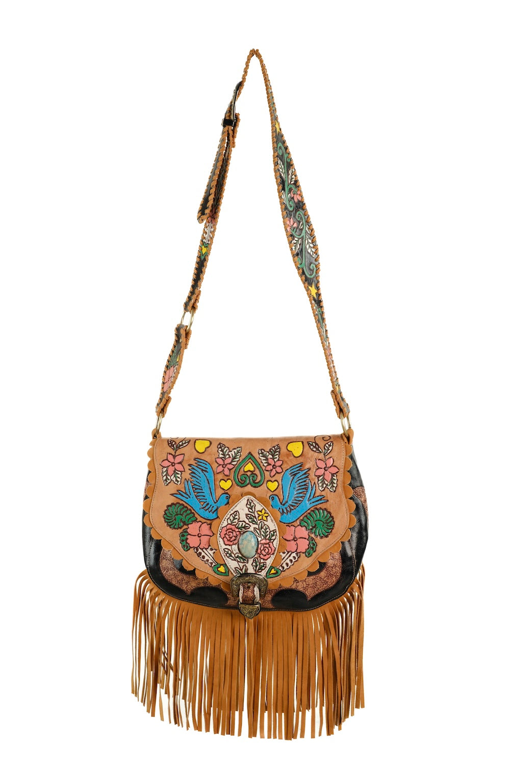 Hand-tooled leather handbag with Western buckle and secure flap closure. Country-boho style accessories designed for real life.