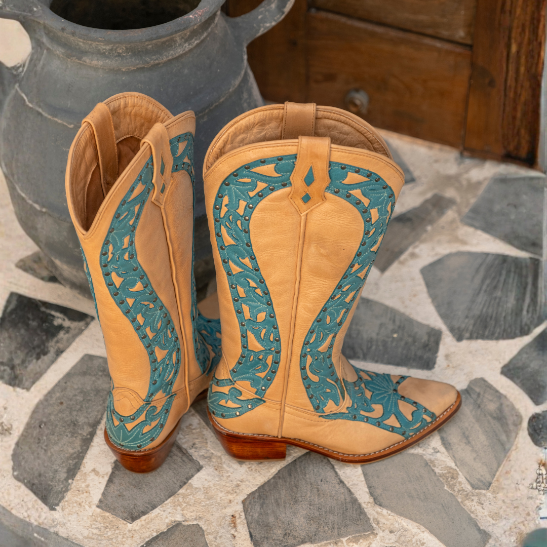 Women's handcrafted leather cowboy boots with turquoise floral detailing and pointed toe