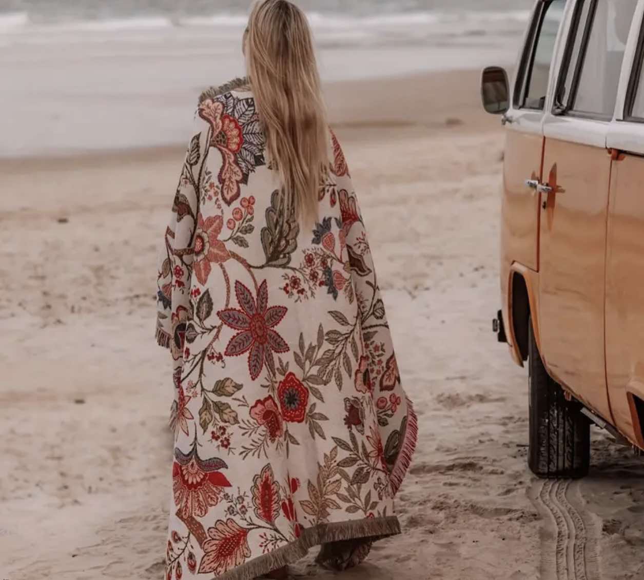 Intricate floral design on the Floral Wanderer Boho Blanket, ideal for adding elegance to beach picnics in Australia.