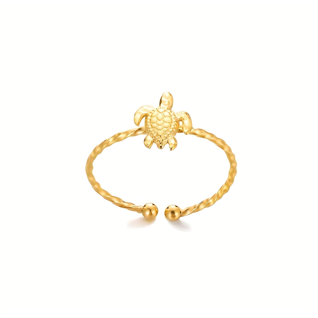 Gold-plated Isla Turtle Ring with adjustable open band and gold ball tips, inspired by ocean beauty.