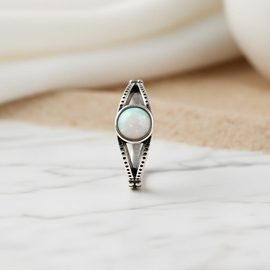 Silver opal stone ring photographed on clean white background by House of Hide