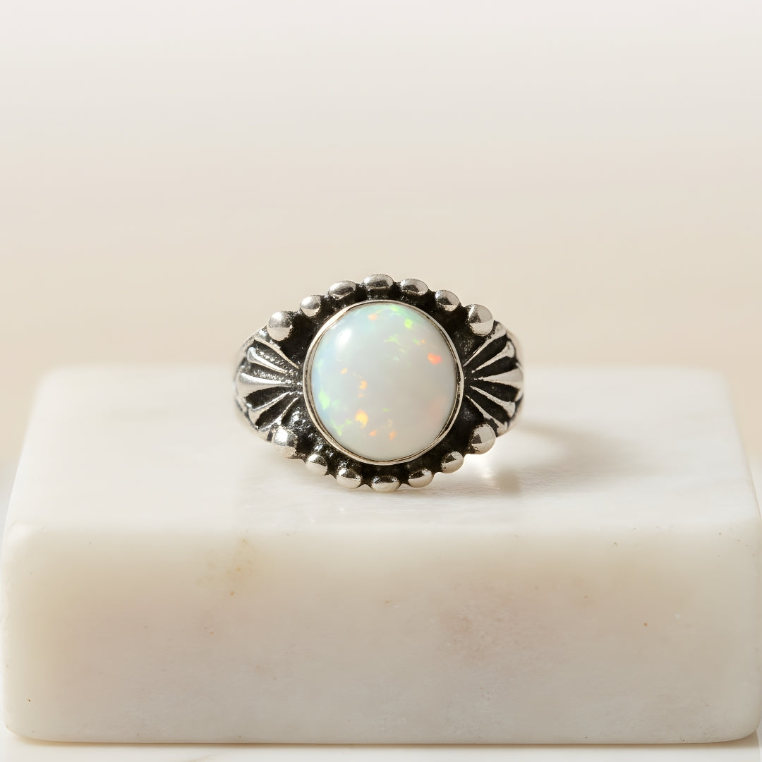 Silver opal stone ring by House of Hide Perth displayed on white background