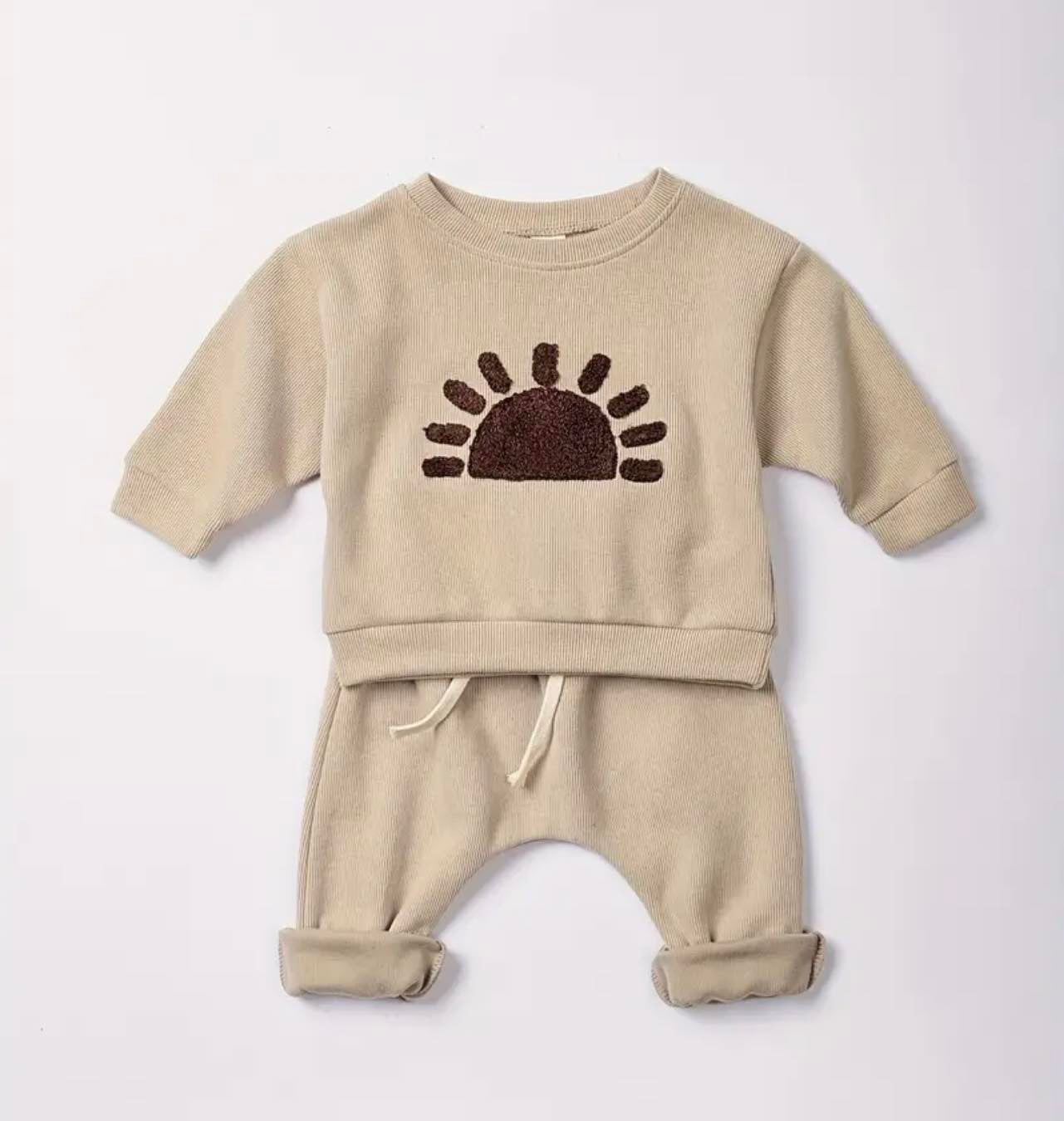 Comfortable kids tracksuit with rainbow emblem sweater and slouch pants in the Sunset Set.