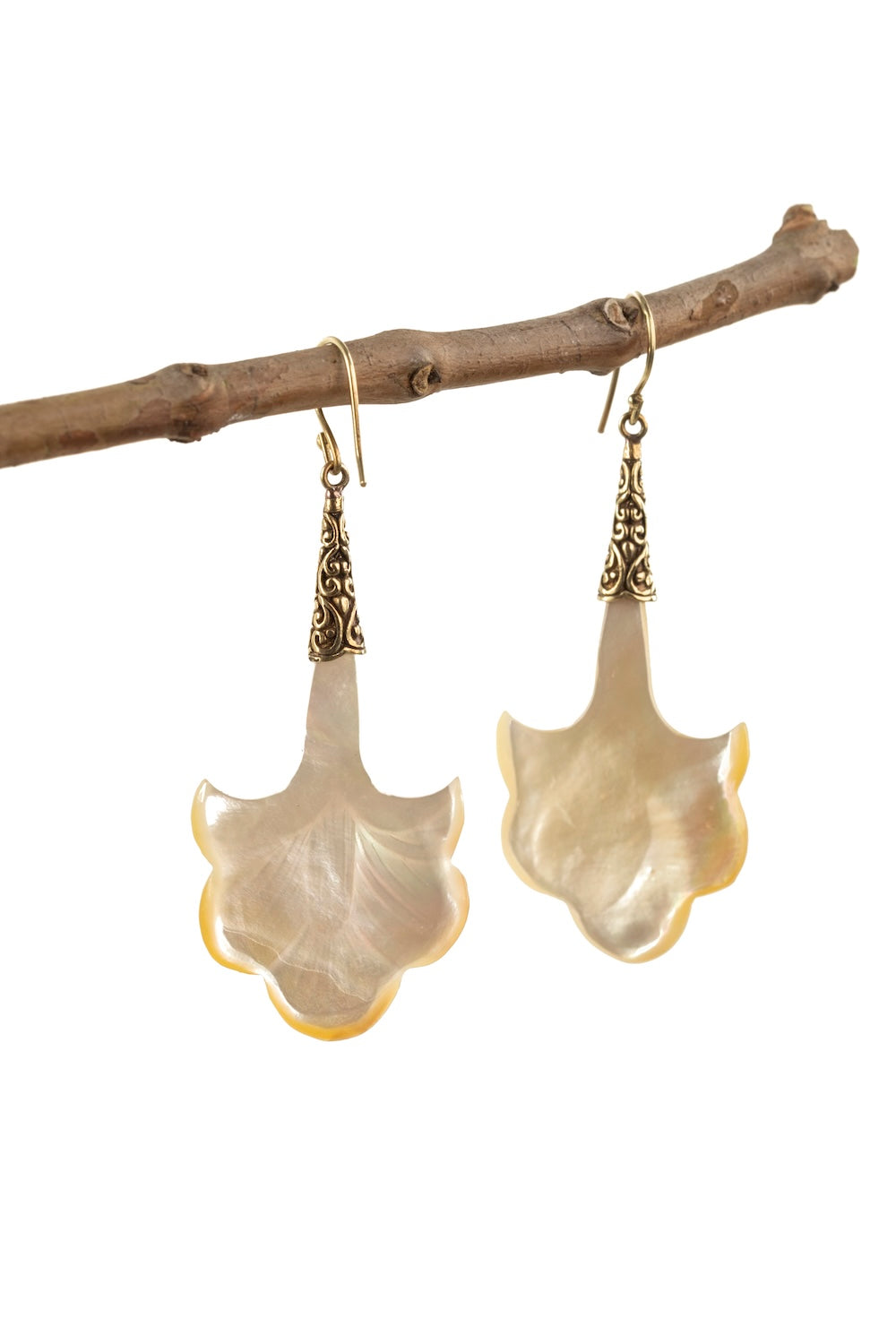 Lightweight gold-plated pearl fan earrings with carved shell drops.