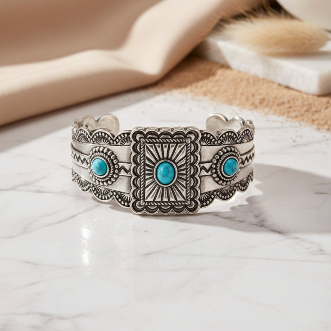 Liora Western Concho bangle displayed on white surface turquoise and silver bangle design