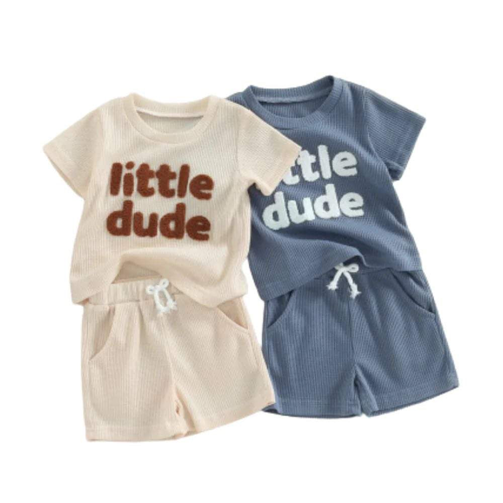 The Little Dude Summer Set is both stylish and practical, with a lightweight cotton fabric to ensure comfort during hot days. The playful “little dude” script adds a cute finishing touch.