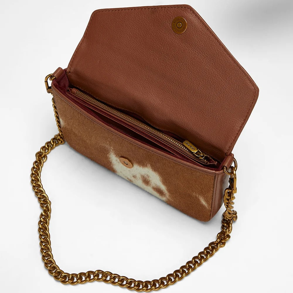 House of Hide genuine leather brown handbag opened to showcase its interior with a gold chain strap on a white background