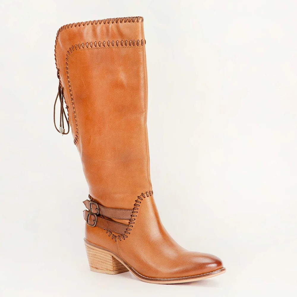 House of Hide genuine leather tan knee-high cowboy boot featuring decorative strap details and western-inspired design on a white background