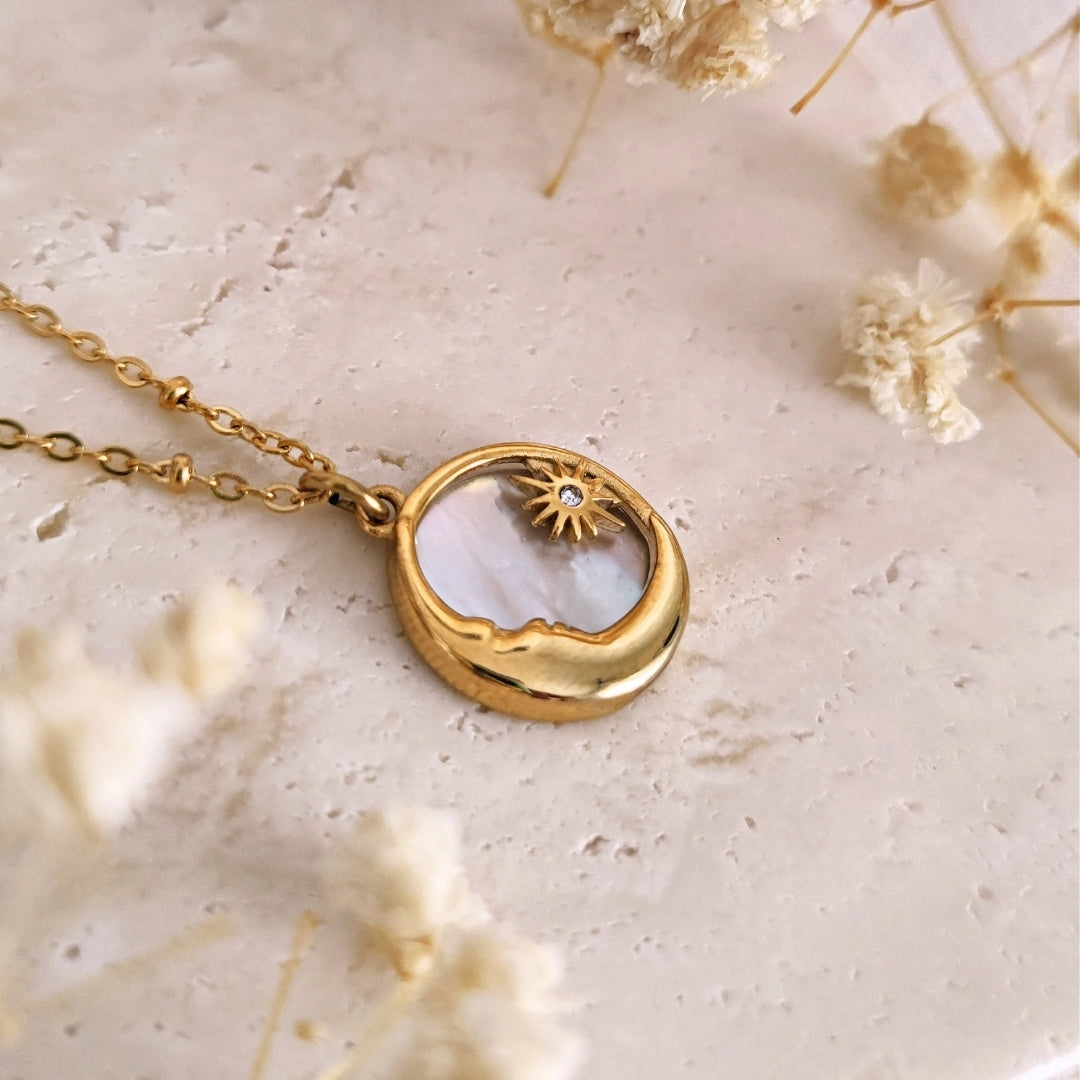 Luna Pendant Necklace Perth Australia House of Hide gold necklace with circular moon pendant on light background