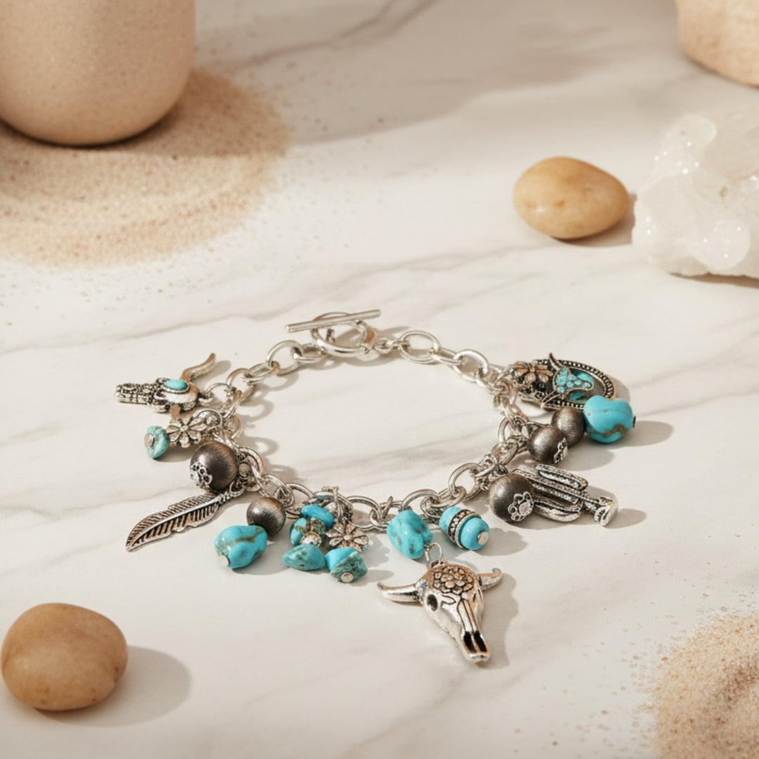 Luxe Nomad Bracelet displayed on white surface western-inspired design with multiple charms