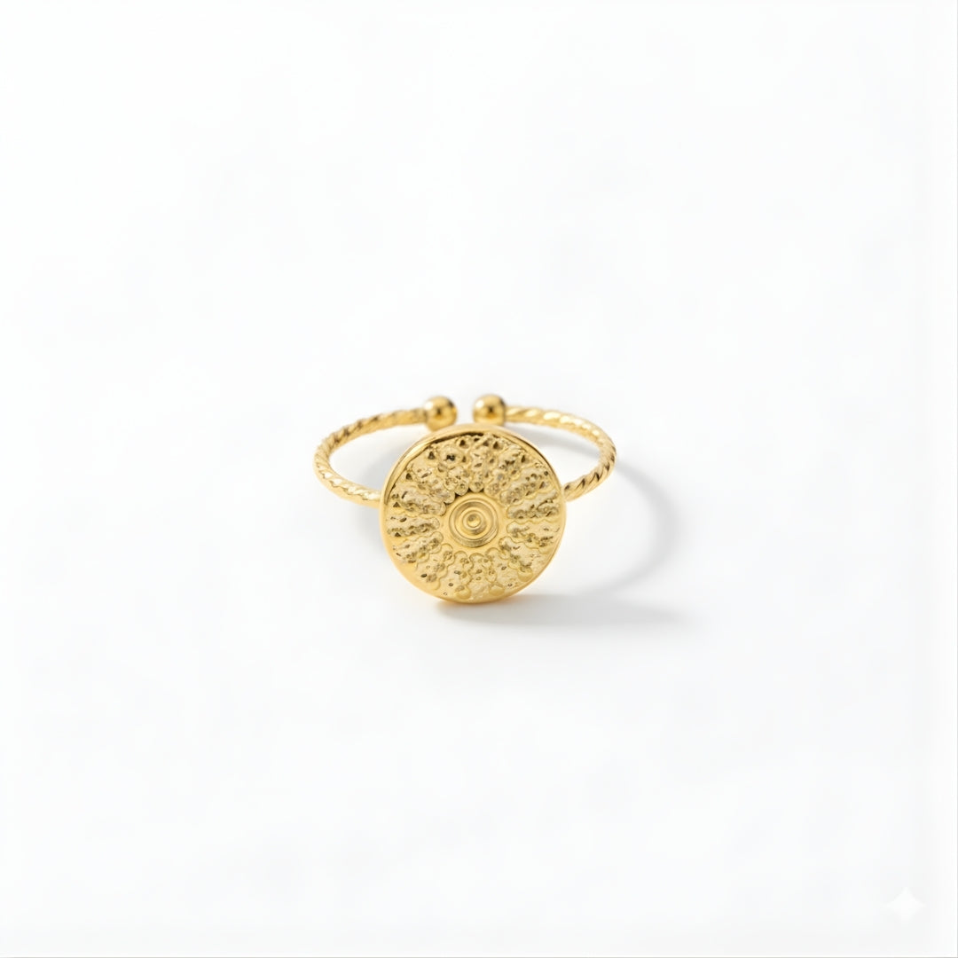 Gold-plated Marigold Mirage statement ring with twisted band design, radiating warmth and elegance.