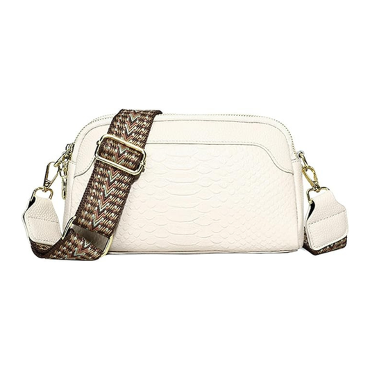 An off-white faux-snakeskin shoulder bag with a patterned brown and beige woven strap and gold-tone hardware, shown against a plain white background.