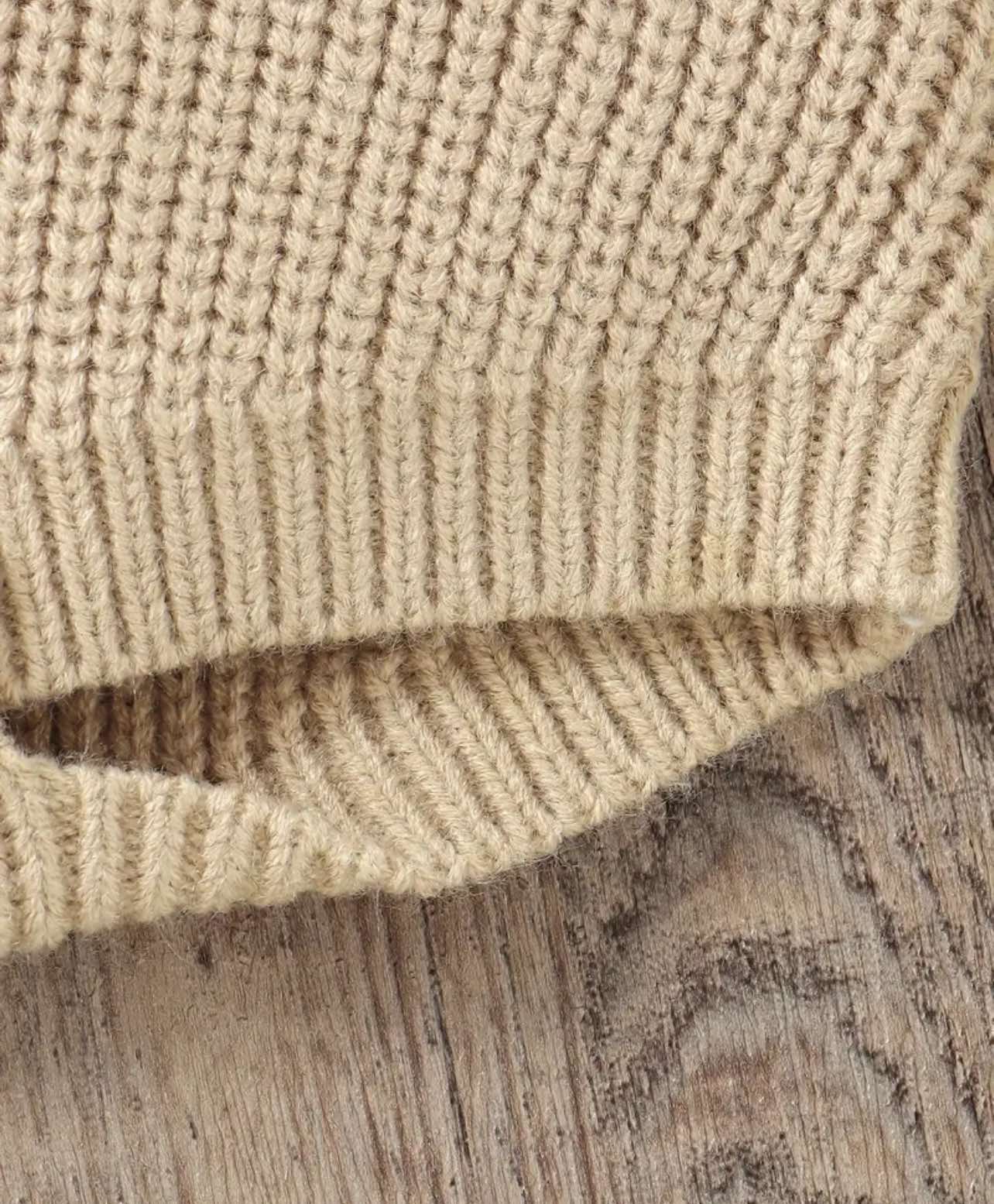 Neutral-toned baby romper with a sweet embroidered message, made from soft, high-quality cotton knit—an essential outfit for little ones in Australia during any season.