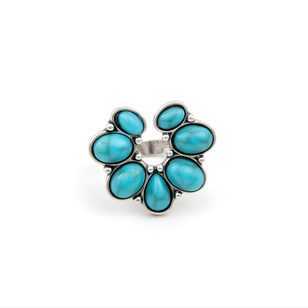 Pacific Bloom Ring Perth Australia House of Hide turquoise stone ring with silver band on light background