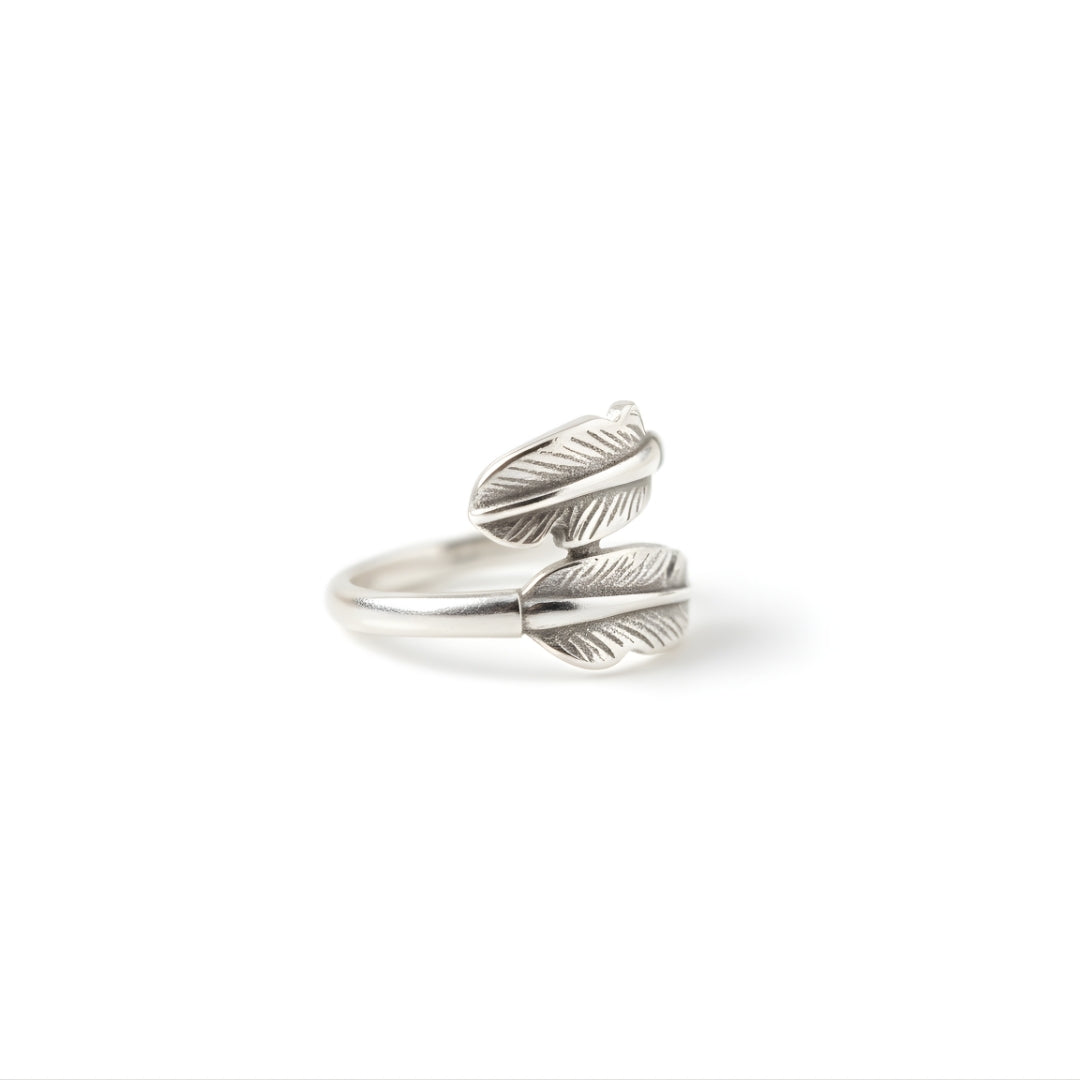 Feather-inspired silver ring by House of Hide Perth displayed on white surface