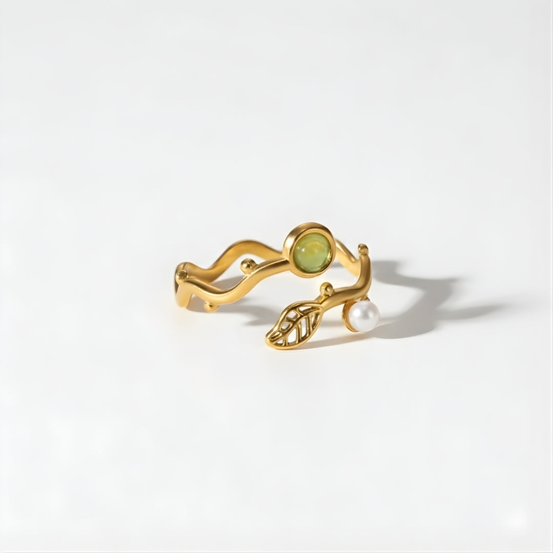 Side view of Pearl Leaf Harmony Ring highlighting the flowing organic band and delicate pearl accent.