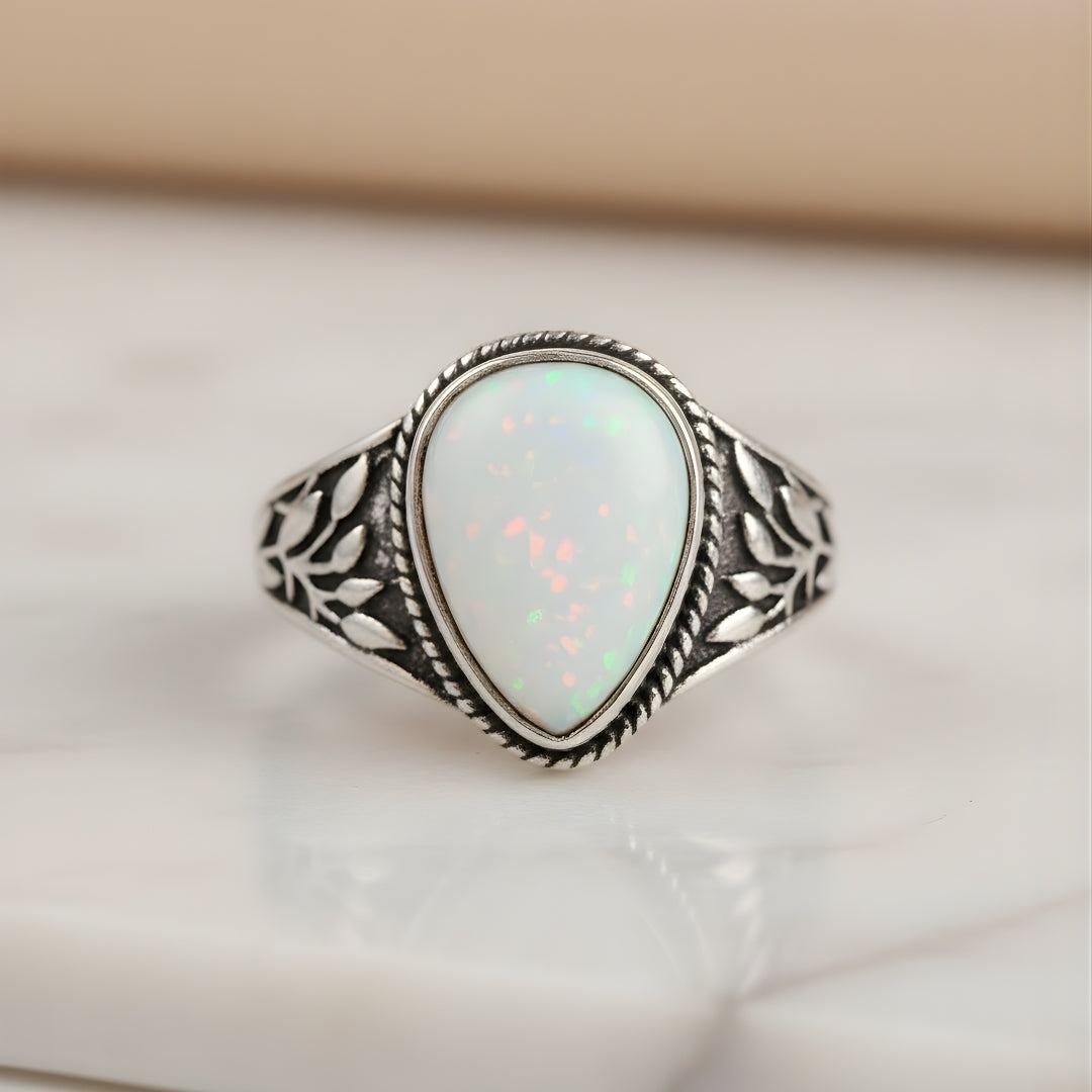 Pearl of the Palms Ring with luminous white opal and leaf accents luxury Perth jewellery