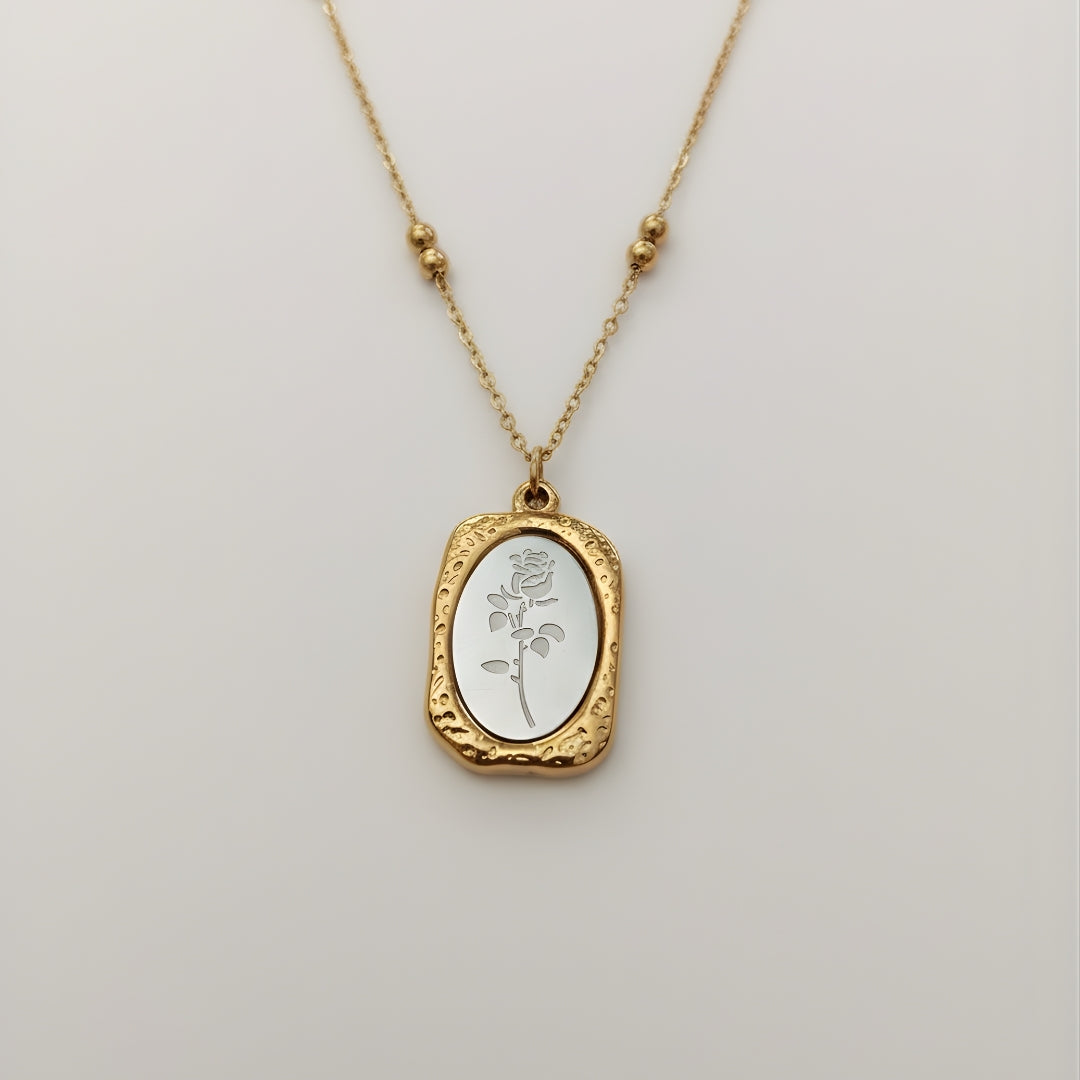 Roselle Pendant Necklace Perth Australia House of Hide gold necklace with engraved floral pendant on light gray background