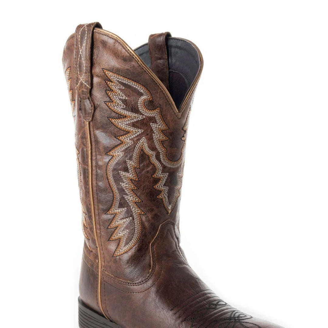 Close-up of the Salvage boot’s brown leather shaft, cream and tan wing-style stitching and leather pull straps.