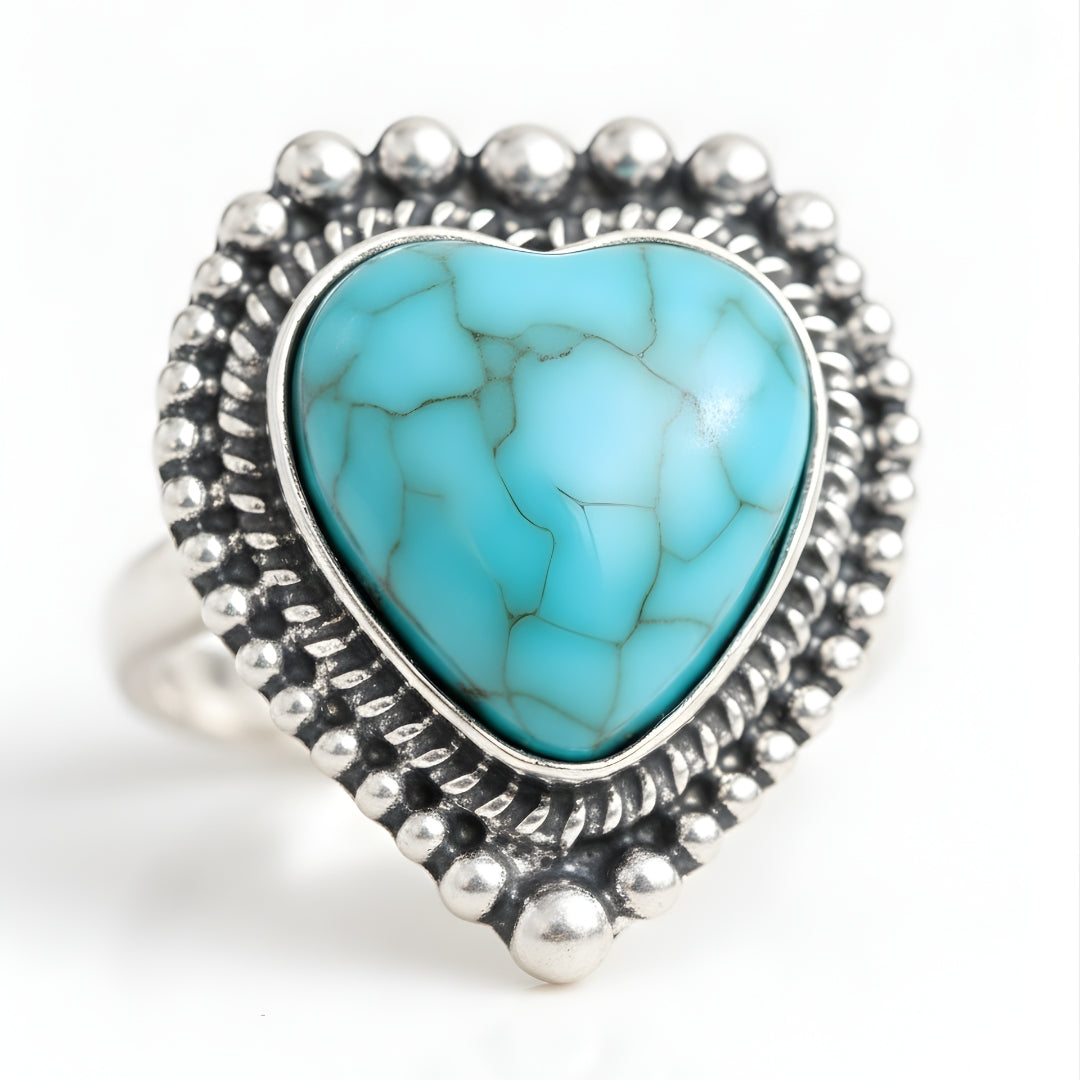 Heart-shaped turquoise ring with engraved silver band by House of Hide Perth jewellery