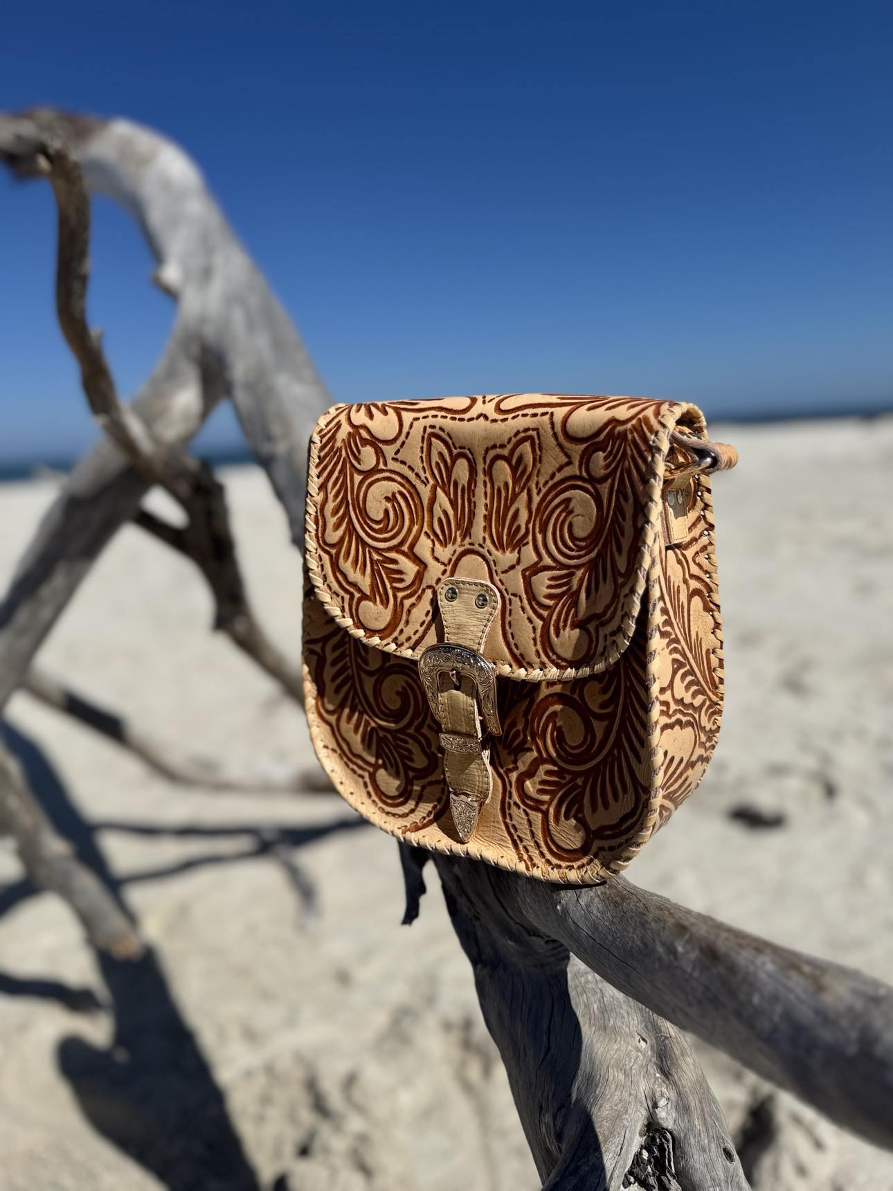 Side profile of Millie bag highlighting adjustable shoulder strap