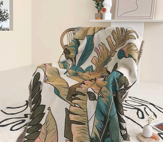 Soft green palm leaf throw blanket for cozy lounging in Australia.