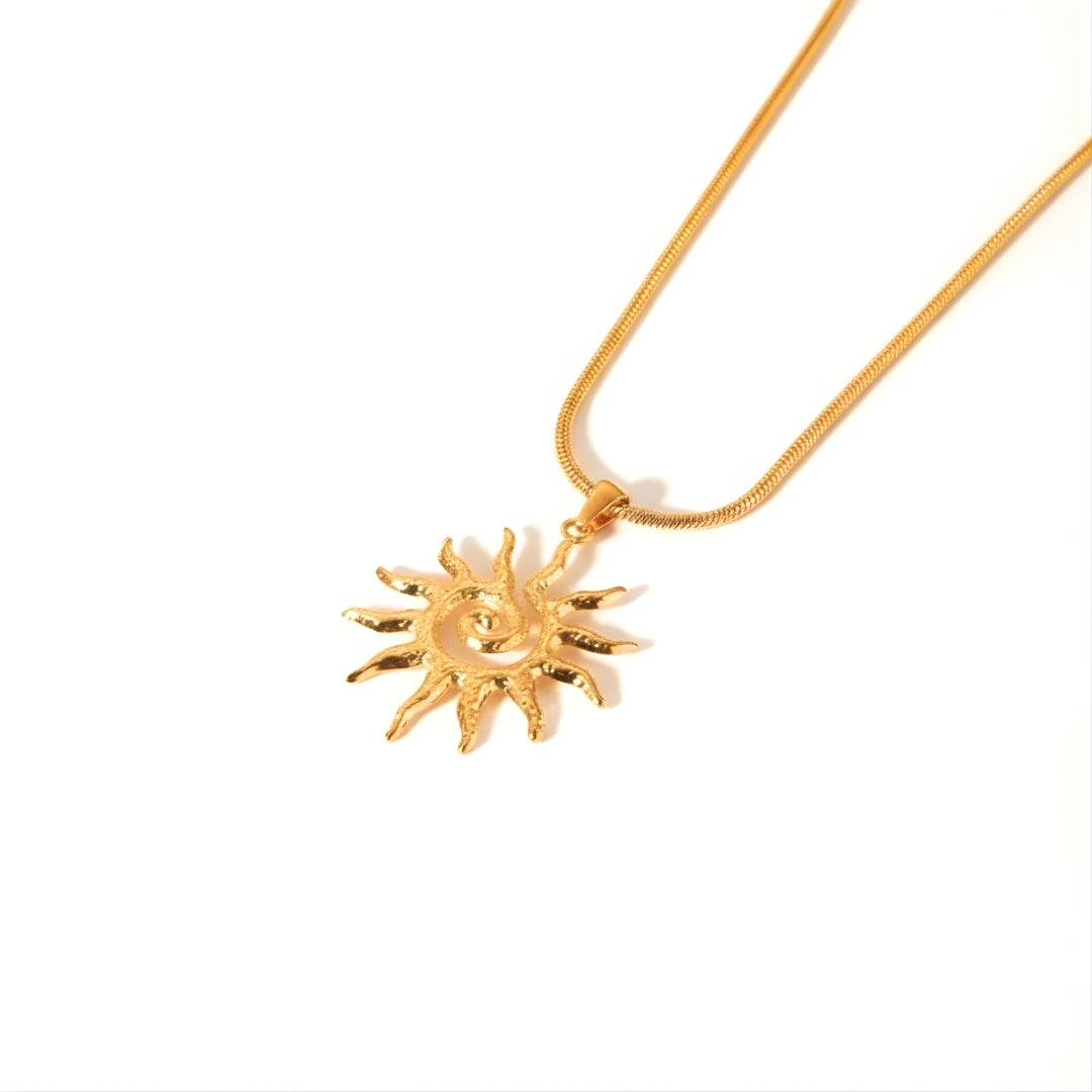 Solaris Charm Necklace Perth Australia House of Hide gold sun-shaped pendant on white background