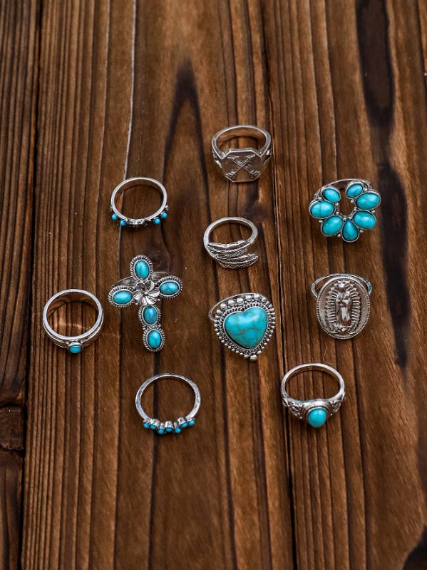 Turquoise ring set Australia, antiqued silver designs with heart stone, floral cross, and bead cluster for rustic desert elegance.