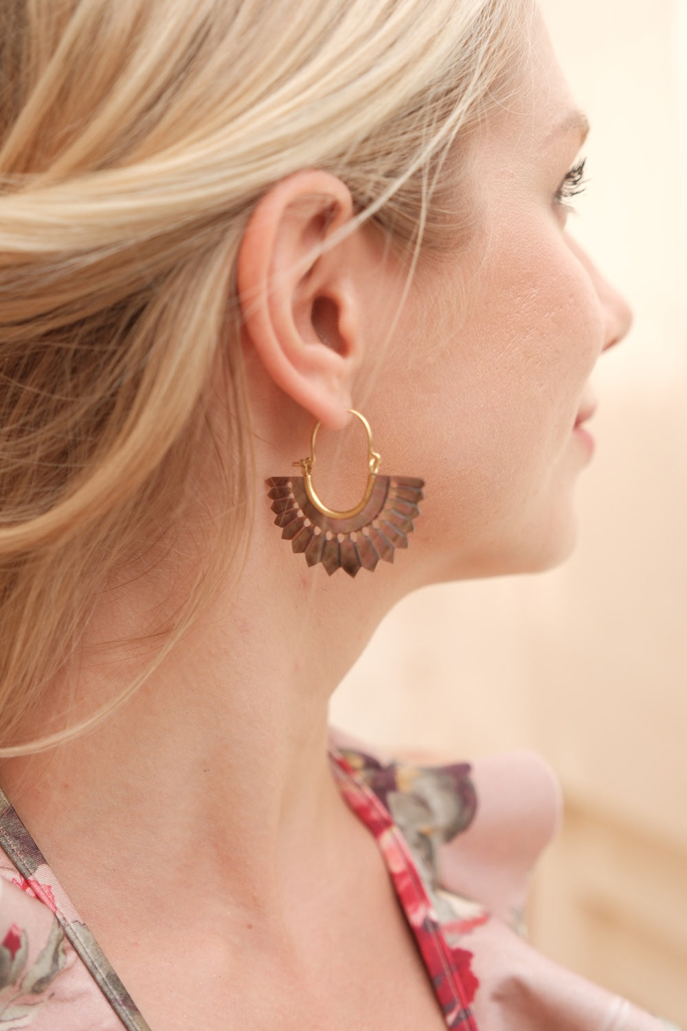 Sunburst earrings with natural iridescent tones