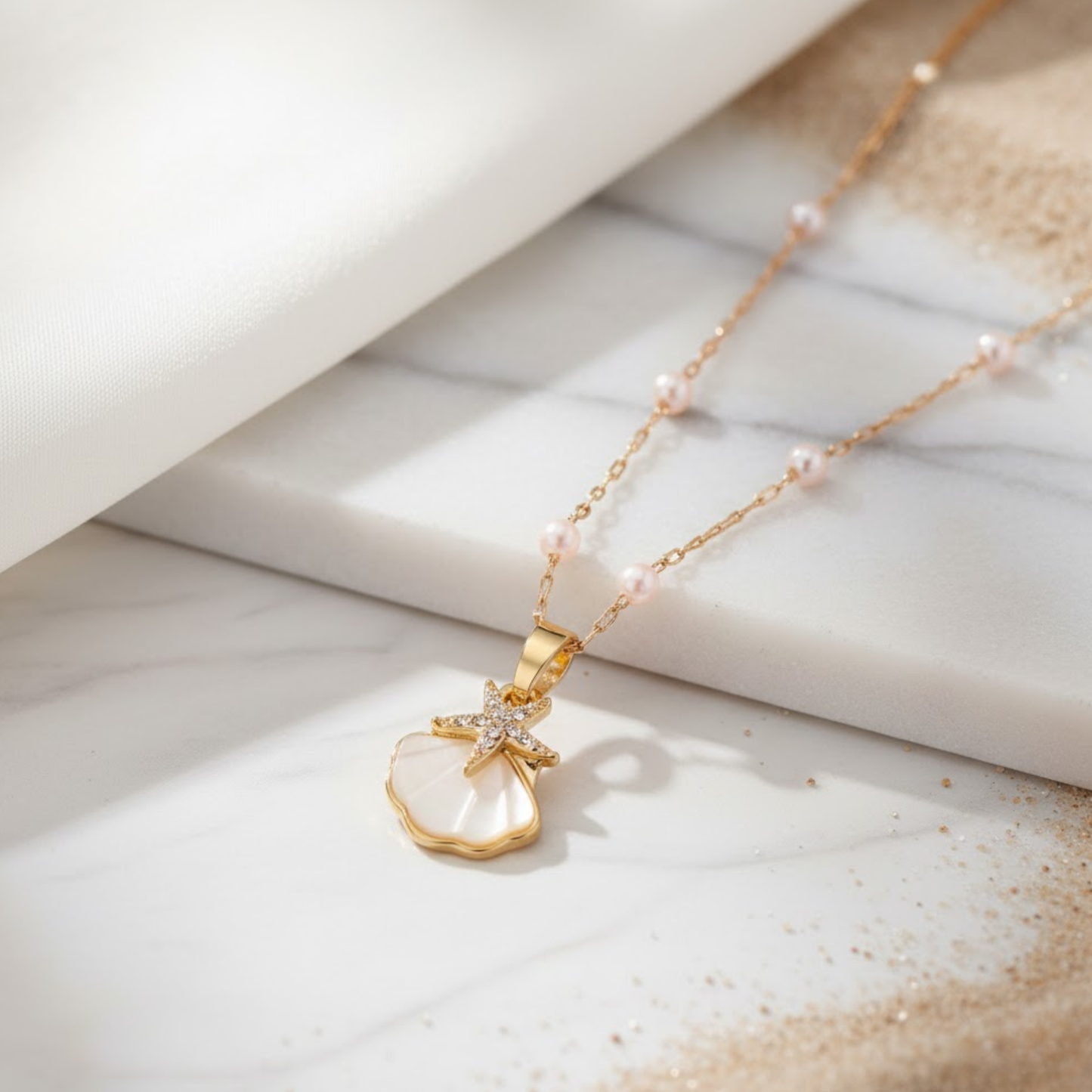 House of Hide Sunlit Shell Necklace featuring golden stainless steel and natural white shell pendant