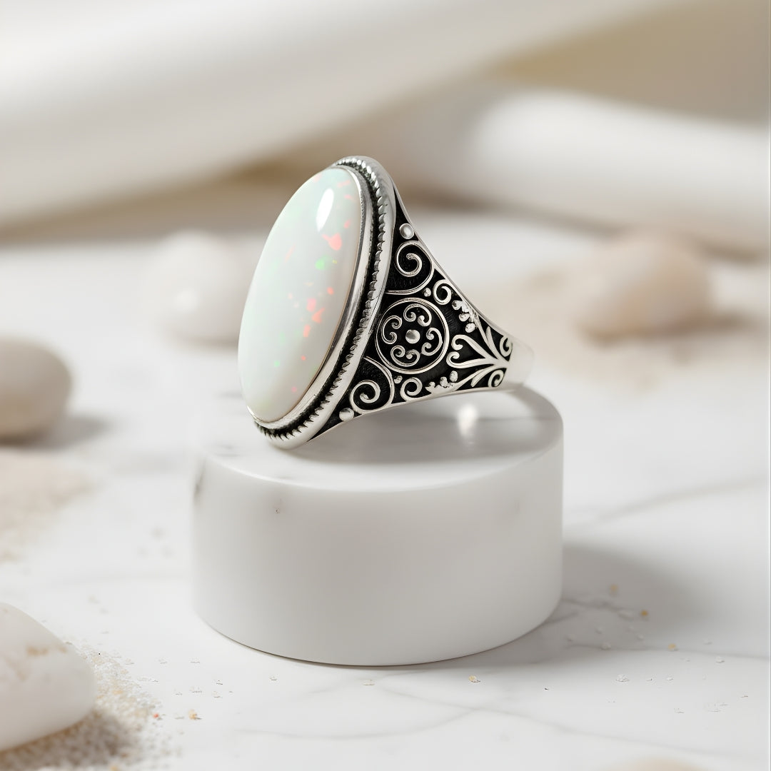 Engraved silver ring featuring white gemstone by House of Hide Perth jewellery